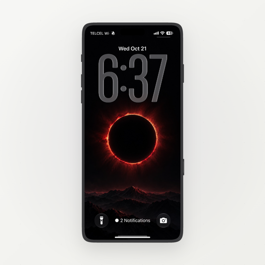Front-facing phone displaying a glowing red eclipse above dark mountain ridges on black.