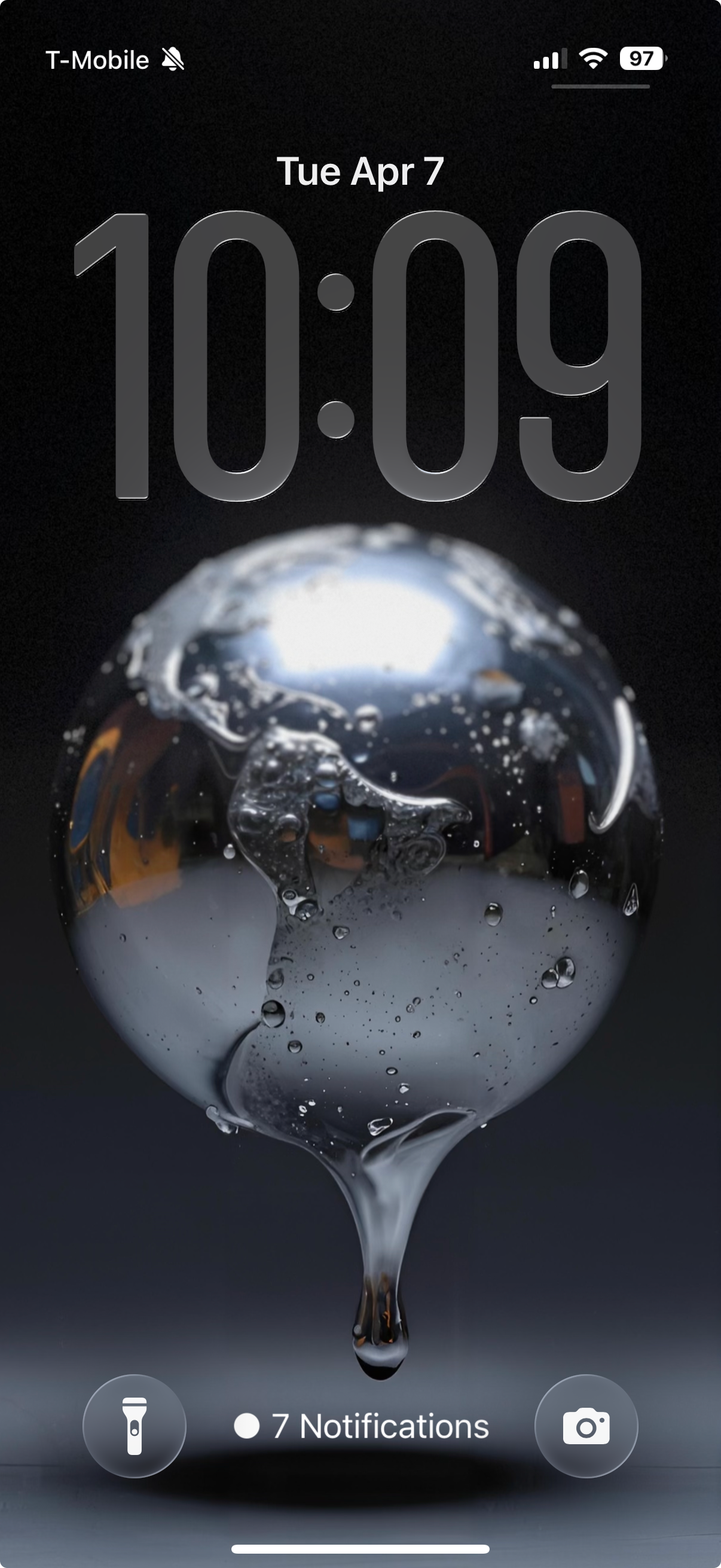 Phone screen showing a water droplet graphic with time and date at the top.