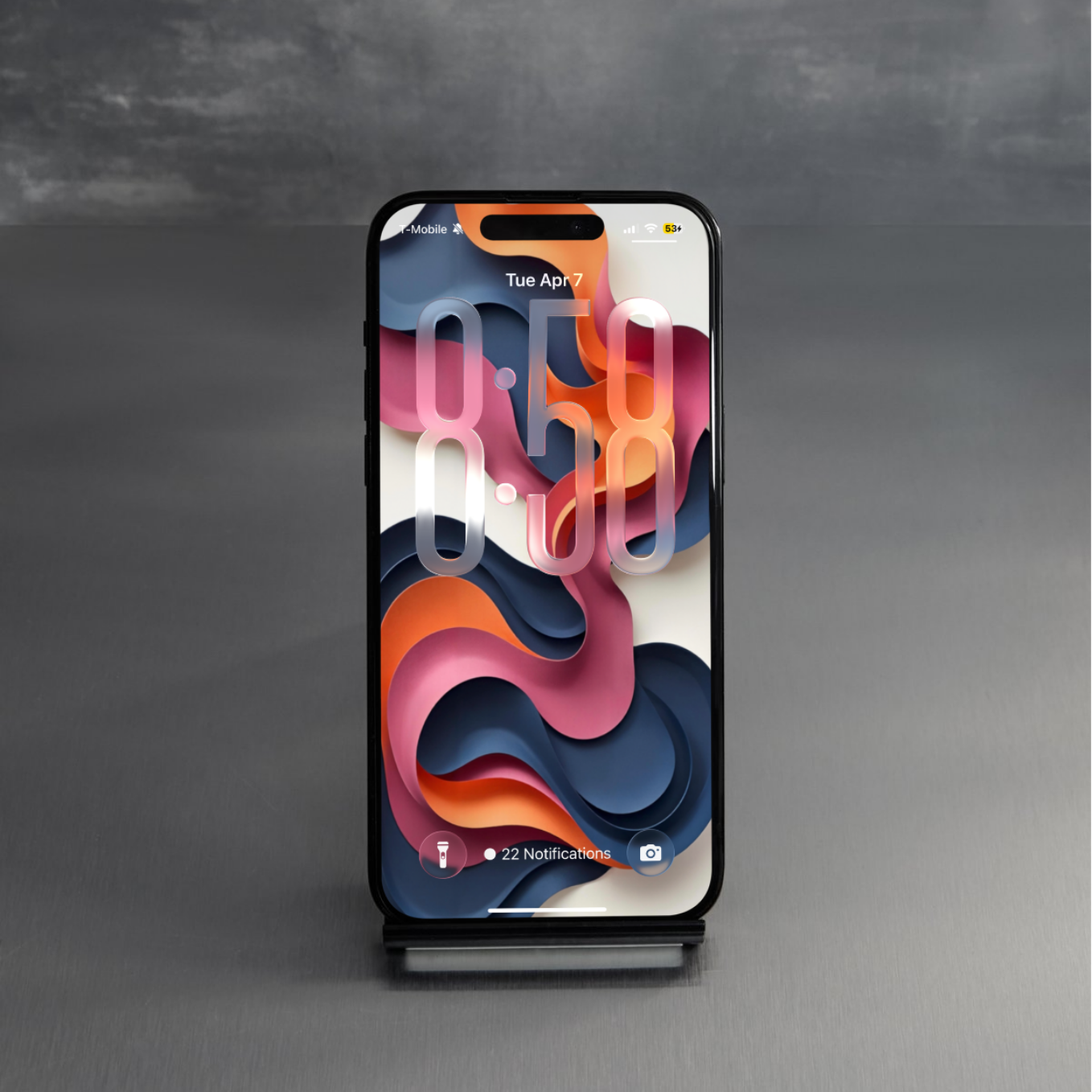 Smartphone with a colorful abstract design on a gray background